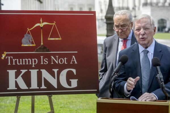 Sen. Dick Durbin, D-Ill., speaks as Senate Minority Leader Chuck Schumer, D-N.Y., listens during a news conference regarding provisions in the House-passed Republican One Big, Beautiful Bill Act, at the Capitol, Thursday, June 5, 2025, in Washington. (AP Photo/Rod Lamkey, Jr.)