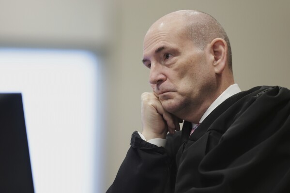 Judge Steven Hippler listens at the sentencing hearing of Bryan Kohberger at the Ada County Courthouse, Wednesday, July 23, 2025, in Boise, Idaho, for brutally stabbing four University of Idaho students to death nearly three years ago. (AP Photo/Kyle Green, Pool)