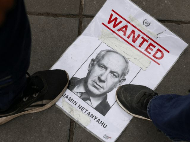 People step on a piece of paper with the image of Israeli Prime Minister Benjamin Netanyahu, during a protest in support of Palestinians, calling for an immediate ceasefire in Gaza, amid the ongoing conflict between Israel and Hamas, in Paris, France on July 31, 2025. Photo: Reuters