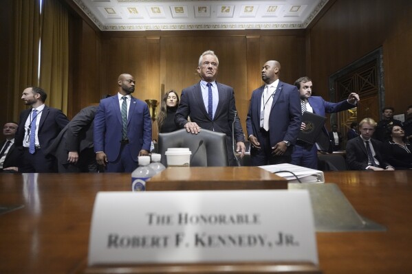 Secretary of Health and Human Services Robert F. Kennedy Jr., arrives to appear before the Senate Finance Committee, on Capitol Hill in Washington, Thursday, Sept. 4, 2025. (AP Photo/Mark Schiefelbein)