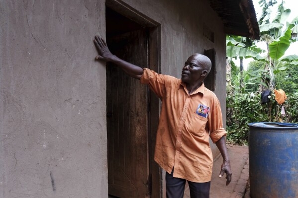 Simon Tigawalana shows some of EarthEnable's work on his home on May 16, 2025, in Jinja, Uganda. (AP Photo/Hajarah Nalwadda)
