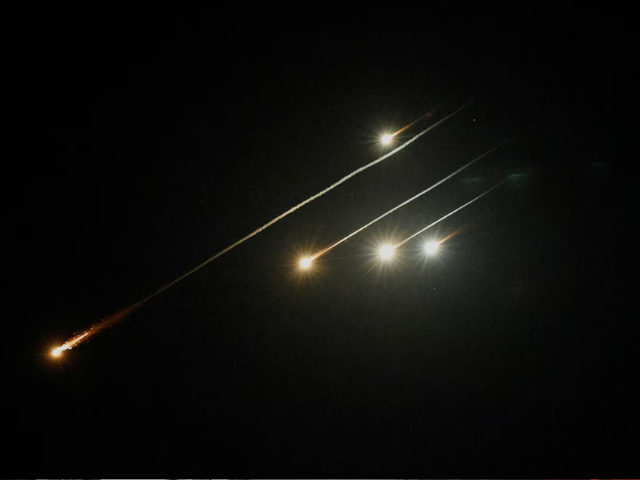 Missiles launched from Iran are seen from the city of Ashkelon, Israel, June 13. REUTERS/Amir Cohen